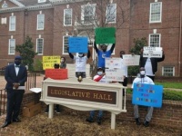 Activists protest the lack of diversity on the Chancery Court (Photo: Business Wire)